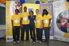 Kelly Holmes with young athletes in Ealing