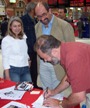 Peter Inson signs his new book